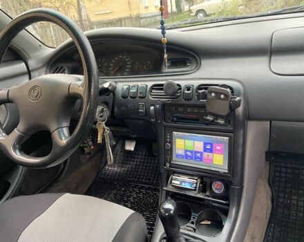 Черный Мазда 626, объемом двигателя 2 л и пробегом 300 тыс. км за 1150 $, фото 21 на Automoto.ua