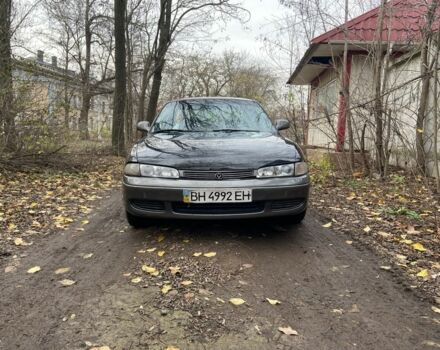 Черный Мазда 626, объемом двигателя 2 л и пробегом 300 тыс. км за 1150 $, фото 6 на Automoto.ua