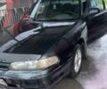 Черный Мазда 626, объемом двигателя 2 л и пробегом 345 тыс. км за 1650 $, фото 1 на Automoto.ua