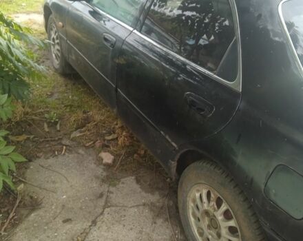 Черный Мазда 626, объемом двигателя 0 л и пробегом 300 тыс. км за 1069 $, фото 1 на Automoto.ua