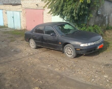 Черный Мазда 626, объемом двигателя 0 л и пробегом 300 тыс. км за 1069 $, фото 6 на Automoto.ua