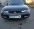 Черный Мазда 626, объемом двигателя 1.8 л и пробегом 101 тыс. км за 1500 $, фото 1 на Automoto.ua