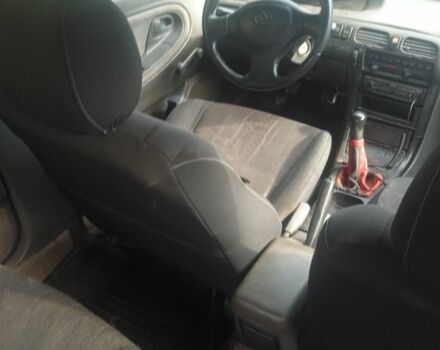 Черный Мазда 626, объемом двигателя 0 л и пробегом 300 тыс. км за 1069 $, фото 3 на Automoto.ua