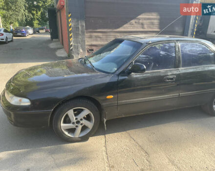 Черный Мазда 626, объемом двигателя 2 л и пробегом 380 тыс. км за 1200 $, фото 7 на Automoto.ua