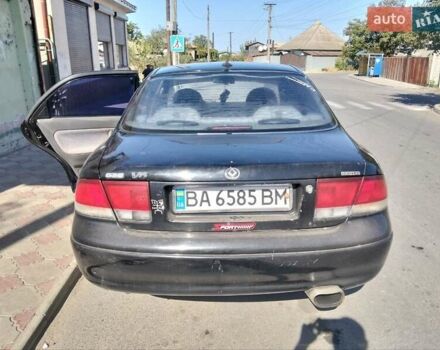 Чорний Мазда 626, об'ємом двигуна 2 л та пробігом 200 тис. км за 1700 $, фото 3 на Automoto.ua