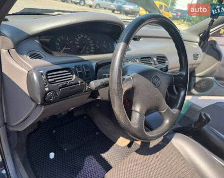 Черный Мазда 626, объемом двигателя 1.79 л и пробегом 310 тыс. км за 2999 $, фото 12 на Automoto.ua