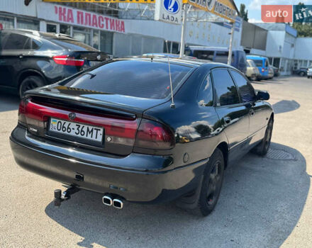 Черный Мазда 626, объемом двигателя 1.79 л и пробегом 310 тыс. км за 2999 $, фото 3 на Automoto.ua