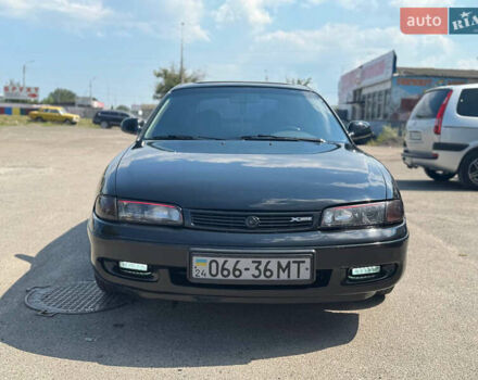 Черный Мазда 626, объемом двигателя 1.79 л и пробегом 310 тыс. км за 2999 $, фото 1 на Automoto.ua