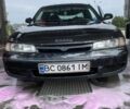 Черный Мазда 626, объемом двигателя 2 л и пробегом 345 тыс. км за 1650 $, фото 1 на Automoto.ua