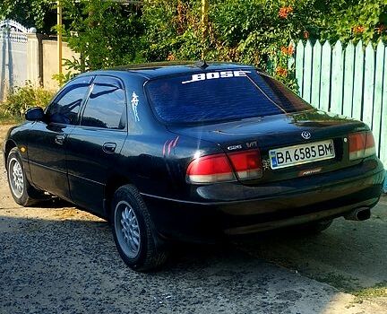 Чорний Мазда 626, об'ємом двигуна 2 л та пробігом 0 тис. км за 1900 $, фото 2 на Automoto.ua