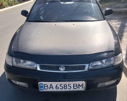 Чорний Мазда 626, об'ємом двигуна 2 л та пробігом 200 тис. км за 1700 $, фото 1 на Automoto.ua