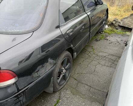 Черный Мазда 626, объемом двигателя 1.8 л и пробегом 390 тыс. км за 993 $, фото 6 на Automoto.ua