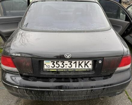Черный Мазда 626, объемом двигателя 1.8 л и пробегом 390 тыс. км за 993 $, фото 2 на Automoto.ua