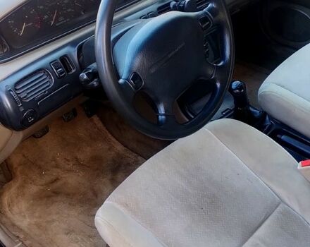 Чорний Мазда 626, об'ємом двигуна 2 л та пробігом 200 тис. км за 2000 $, фото 5 на Automoto.ua