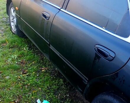 Чорний Мазда 626, об'ємом двигуна 2 л та пробігом 200 тис. км за 2000 $, фото 3 на Automoto.ua