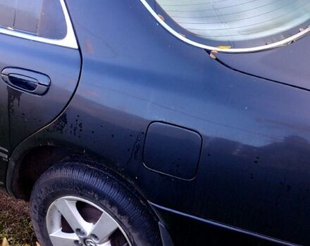 Чорний Мазда 626, об'ємом двигуна 2 л та пробігом 200 тис. км за 2000 $, фото 4 на Automoto.ua