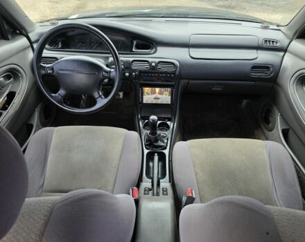 Черный Мазда 626, объемом двигателя 2 л и пробегом 250 тыс. км за 1500 $, фото 4 на Automoto.ua