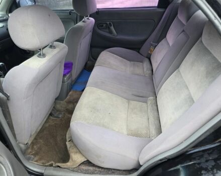 Черный Мазда 626, объемом двигателя 2 л и пробегом 250 тыс. км за 1500 $, фото 5 на Automoto.ua