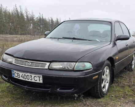 Черный Мазда 626, объемом двигателя 2 л и пробегом 250 тыс. км за 1500 $, фото 1 на Automoto.ua