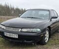 Черный Мазда 626, объемом двигателя 2 л и пробегом 250 тыс. км за 1500 $, фото 1 на Automoto.ua