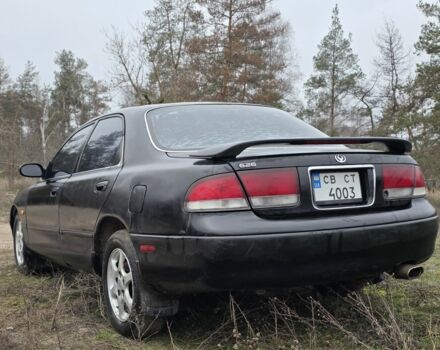 Черный Мазда 626, объемом двигателя 2 л и пробегом 250 тыс. км за 1500 $, фото 2 на Automoto.ua