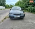 Черный Мазда 626, объемом двигателя 2 л и пробегом 253 тыс. км за 1800 $, фото 1 на Automoto.ua