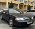 Чорний Мазда 626, об'ємом двигуна 2 л та пробігом 259 тис. км за 2600 $, фото 1 на Automoto.ua