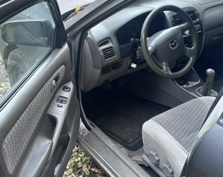 Мазда 626 2000 у Житомирі на Automoto.ua Чорний Мазда 626, об'ємом двигуна 2 л та пробігом 374 тис. км за 550 $, фото 3 на Automoto.ua