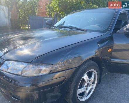 Чорний Мазда 626, об'ємом двигуна 2 л та пробігом 370 тис. км за 2500 $, фото 1 на Automoto.ua