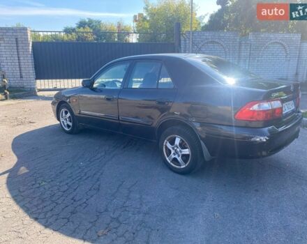 Чорний Мазда 626, об'ємом двигуна 2 л та пробігом 370 тис. км за 2500 $, фото 2 на Automoto.ua