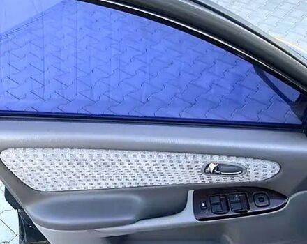 Черный Мазда 626, объемом двигателя 2 л и пробегом 208 тыс. км за 3000 $, фото 2 на Automoto.ua