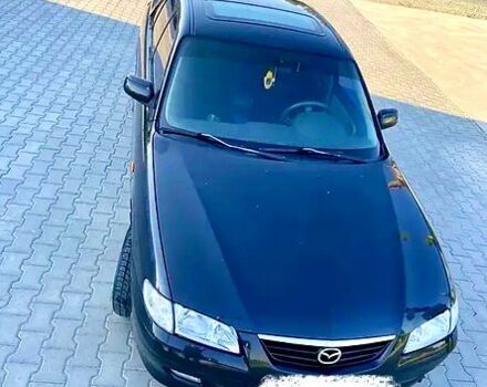 Черный Мазда 626, объемом двигателя 2 л и пробегом 208 тыс. км за 3000 $, фото 1 на Automoto.ua