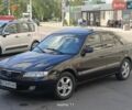 Черный Мазда 626, объемом двигателя 2 л и пробегом 408 тыс. км за 3400 $, фото 1 на Automoto.ua