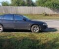 Черный Мазда 626, объемом двигателя 1.8 л и пробегом 500 тыс. км за 1800 $, фото 1 на Automoto.ua