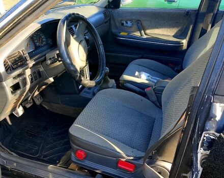 Черный Мазда 626, объемом двигателя 2 л и пробегом 300 тыс. км за 1100 $, фото 4 на Automoto.ua