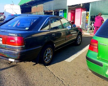 Черный Мазда 626, объемом двигателя 2 л и пробегом 300 тыс. км за 1100 $, фото 2 на Automoto.ua