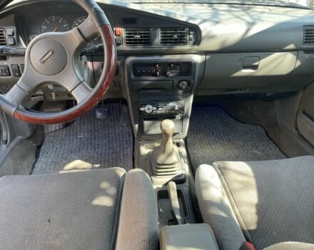 Черный Мазда 626, объемом двигателя 2 л и пробегом 320 тыс. км за 950 $, фото 5 на Automoto.ua