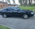 Черный Мазда 626, объемом двигателя 2 л и пробегом 419 тыс. км за 1500 $, фото 1 на Automoto.ua