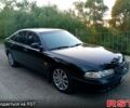 Черный Мазда 626, объемом двигателя 1.8 л и пробегом 333 тыс. км за 1800 $, фото 1 на Automoto.ua