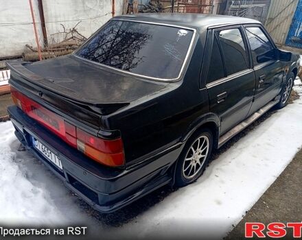 Чорний Мазда 626, об'ємом двигуна 2 л та пробігом 300 тис. км за 1000 $, фото 1 на Automoto.ua