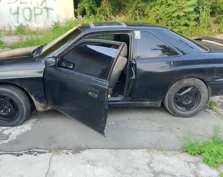 Черный Мазда 626, объемом двигателя 2 л и пробегом 100 тыс. км за 781 $, фото 1 на Automoto.ua
