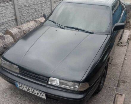 Черный Мазда 626, объемом двигателя 2.2 л и пробегом 400 тыс. км за 1350 $, фото 1 на Automoto.ua