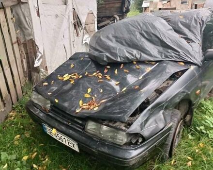 Черный Мазда 626, объемом двигателя 2.2 л и пробегом 400 тыс. км за 500 $, фото 1 на Automoto.ua