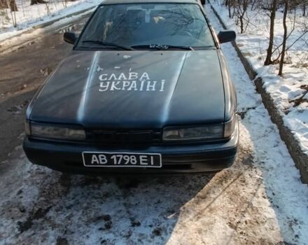 Черный Мазда 626, объемом двигателя 2 л и пробегом 100 тыс. км за 436 $, фото 1 на Automoto.ua