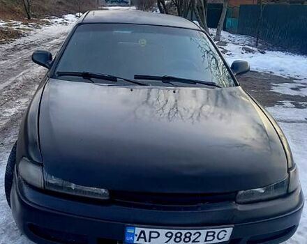 Черный Мазда 626, объемом двигателя 2 л и пробегом 325 тыс. км за 1599 $, фото 1 на Automoto.ua