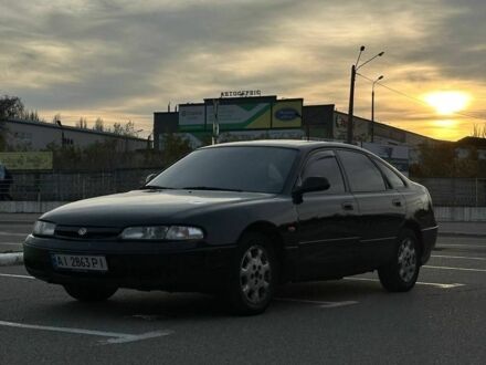 Черный Мазда 626, объемом двигателя 2.5 л и пробегом 483 тыс. км за 1200 $, фото 1 на Automoto.ua