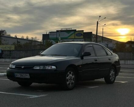 Черный Мазда 626, объемом двигателя 2.5 л и пробегом 483 тыс. км за 1200 $, фото 1 на Automoto.ua