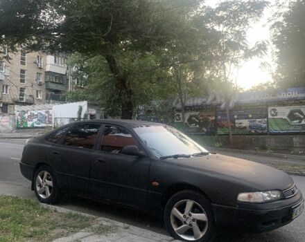 Черный Мазда 626, объемом двигателя 2 л и пробегом 480 тыс. км за 1200 $, фото 1 на Automoto.ua