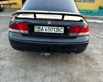 Чорний Мазда 626, об'ємом двигуна 2 л та пробігом 600 тис. км за 1500 $, фото 1 на Automoto.ua