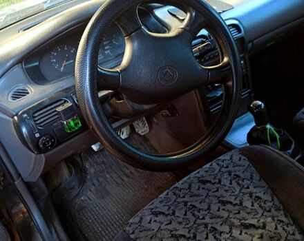 Черный Мазда 626, объемом двигателя 2 л и пробегом 127 тыс. км за 1500 $, фото 1 на Automoto.ua